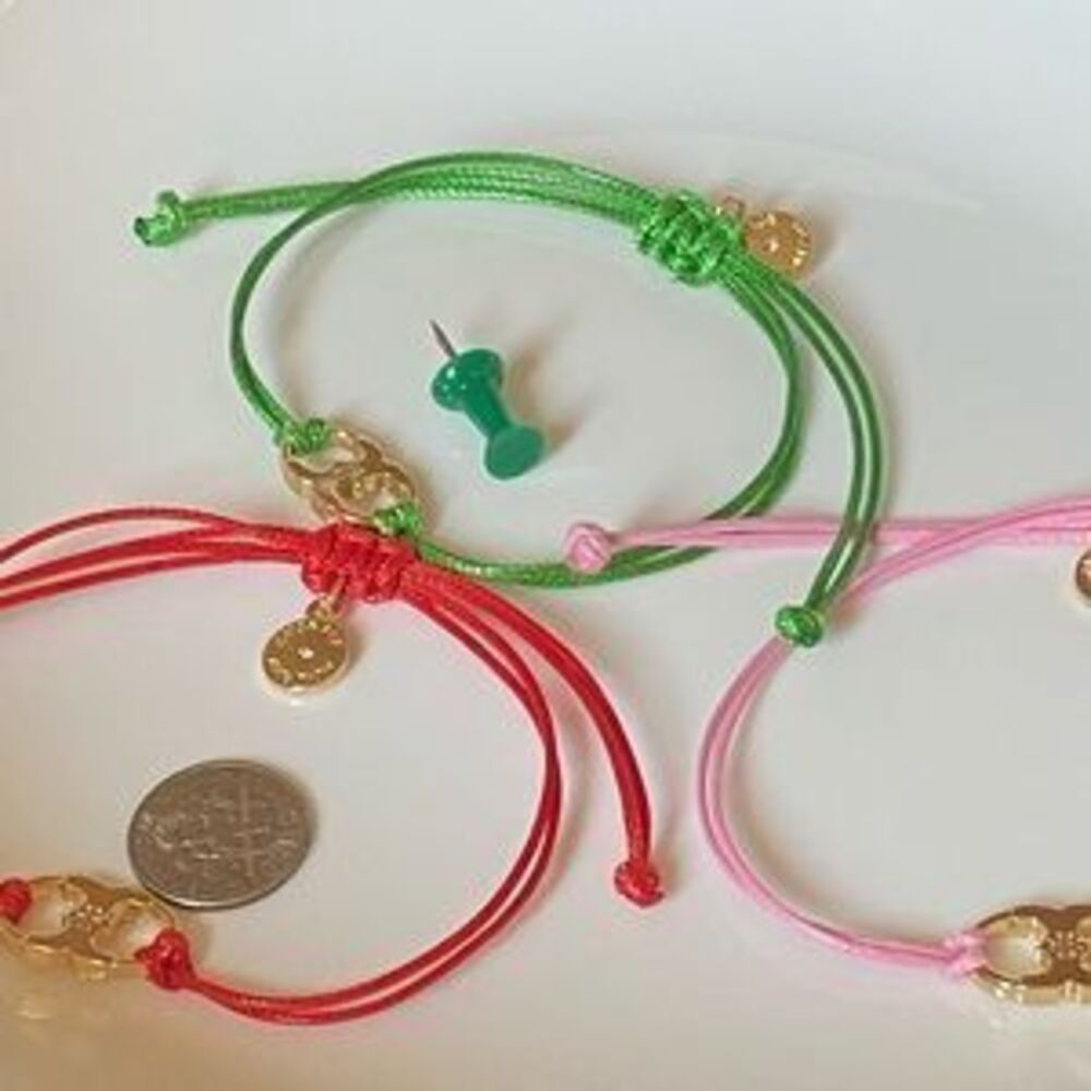 Tory Burch Silk and Gemini gold bracelets
